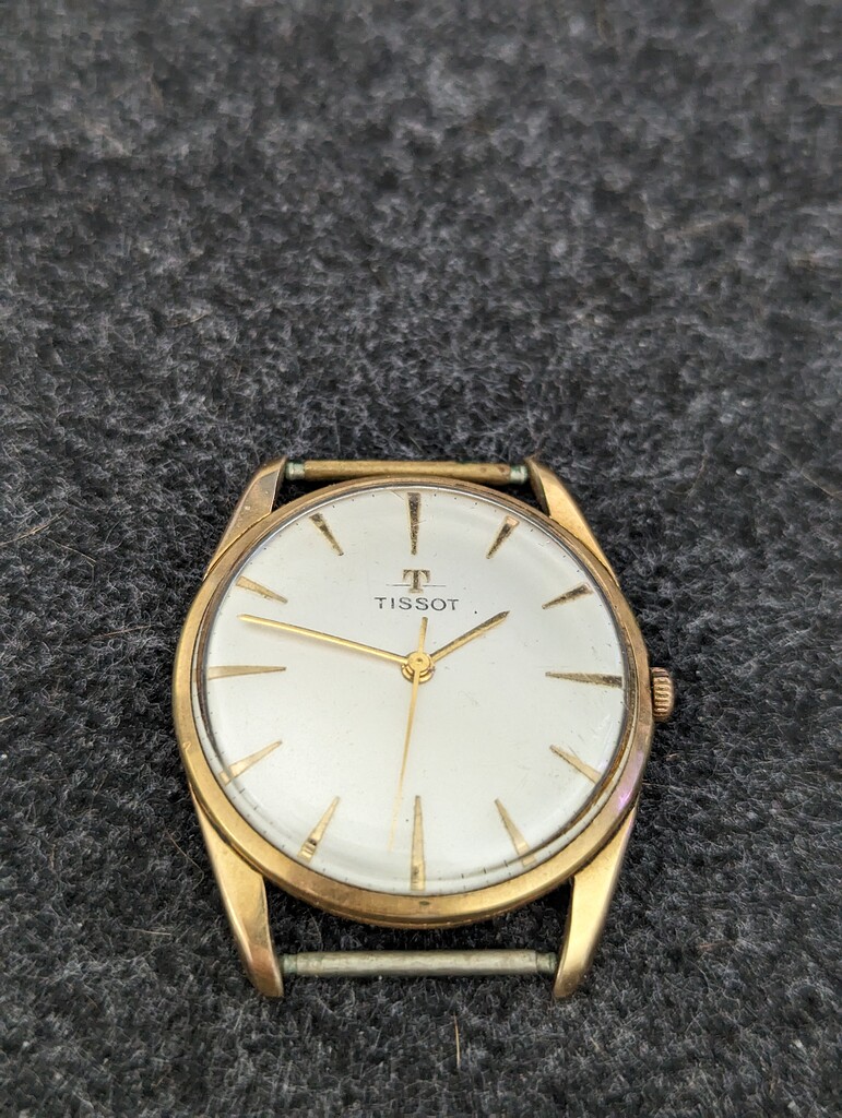 Is dit vintage Tissot horloge het herstellen waard? Vragen over
