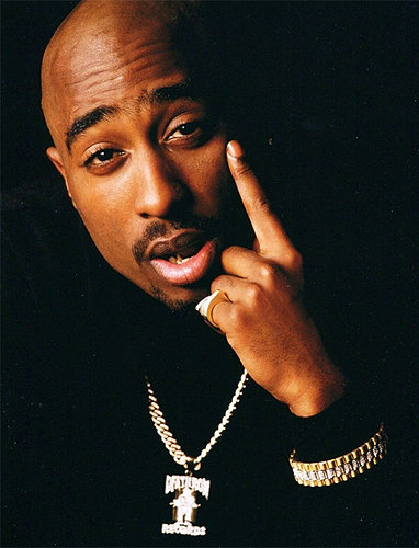tupac_shakur_wearing_death_row_chain_and_rolex_bracelet_rapper-bling