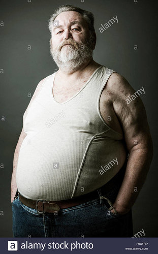 portrait-of-senior-man-with-full-beard-wearing-vest-F9X1RP