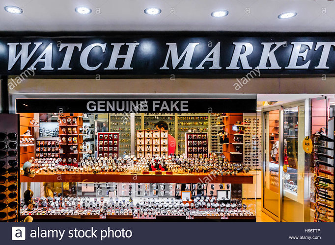 watch-shop-in-fethiye-market-turkey-with-a-sign-saying-genuine-fake-H66TTR