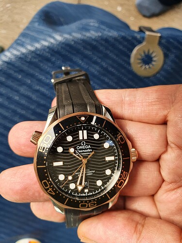 Omega in hand