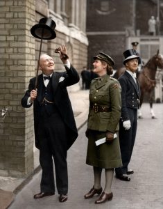 Winston-Churchill-has-fun-with-a-Top-Hat-235x300