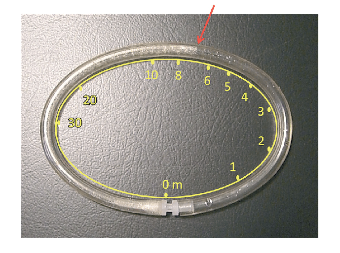 Capillary-depth-gauge-with-water-soluble-dye-showing-the-maximum-dive-depth-of-7-m-red