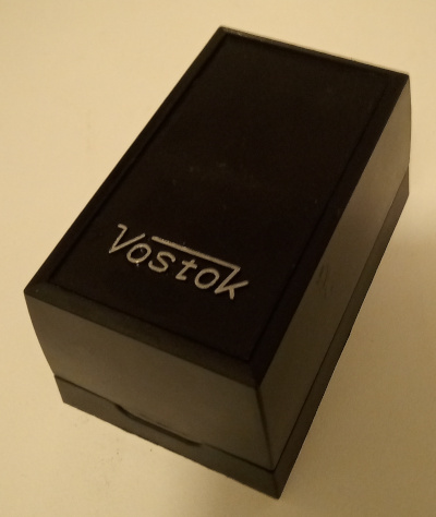 Box with silver lettering