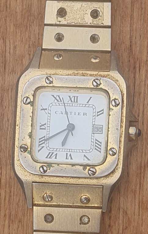 Echtheidskenmerken cartier horloge on sale
